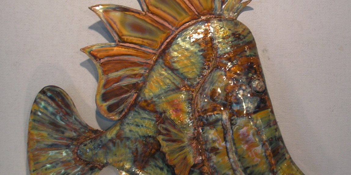 $750. Purple Tail fish in copper. Approx. 42" X 42" and about 3 inches thick. Heat induced color and clear coated